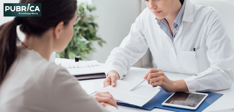 Clinician and reviewer discussing evidence for a NICE technology appraisal submission