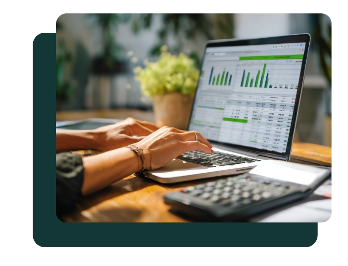 Person working on laptop showing data charts