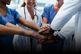 Healthcare providers and medical staff collaborating in a hospital