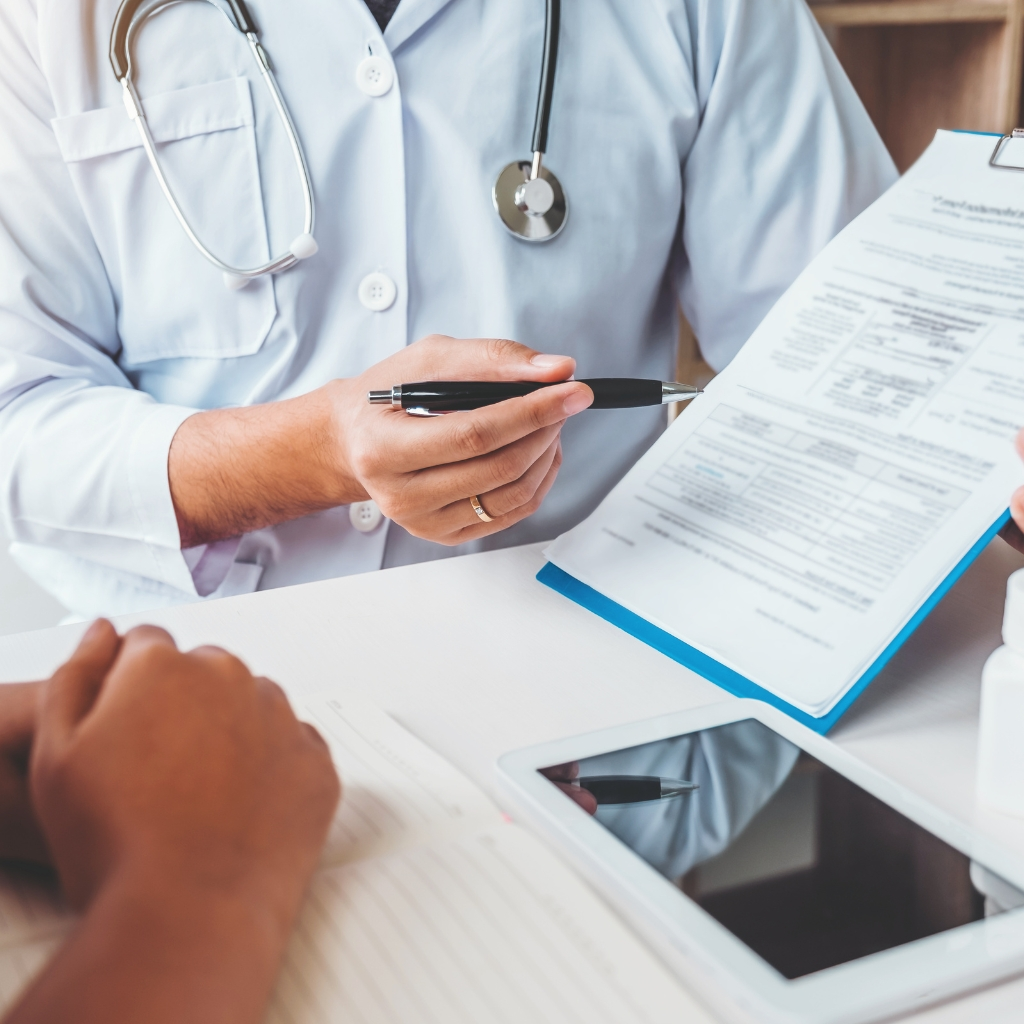 Doctor consulting with patient