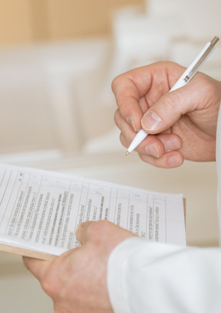 Person reviewing printed document
