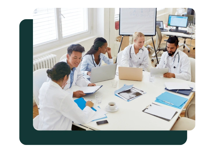 Medical team reviewing clinical training materials