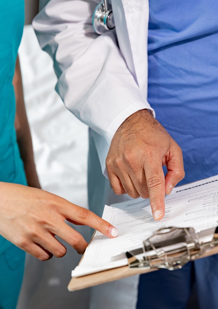 Researchers reviewing document