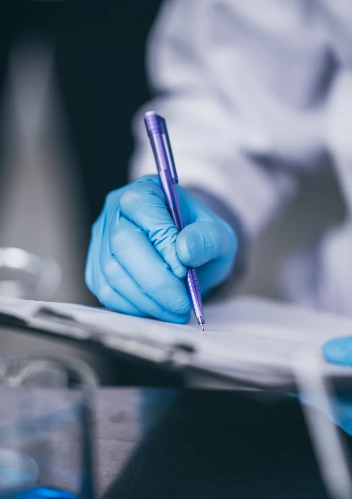 Scientist reviewing research documents